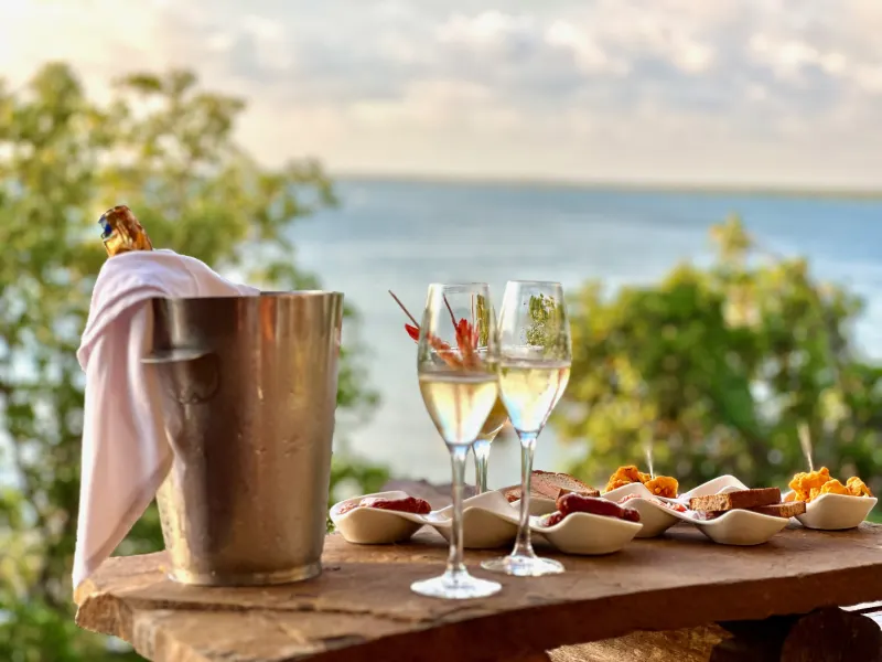 A sunset aperitif with champagne overlooking the ocean at The Rock and Sea
